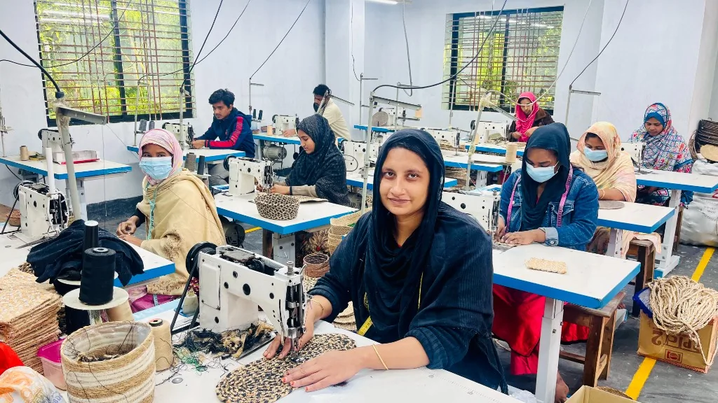Artisans sewing handmade home goods
